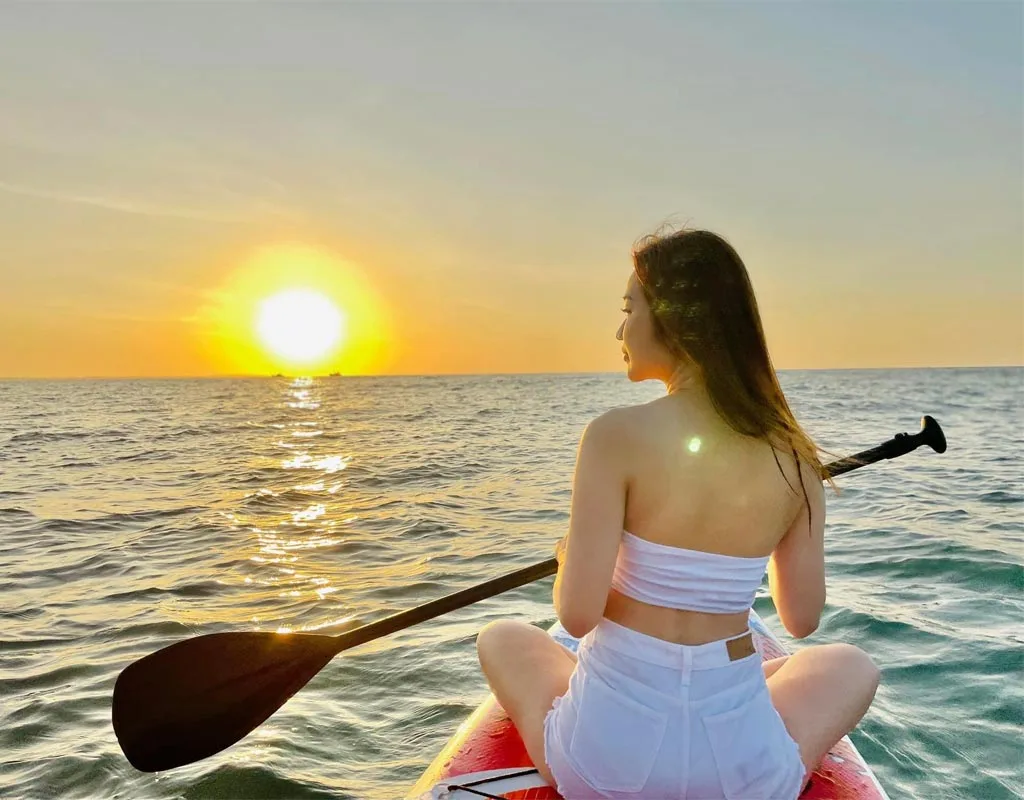 Sunrise SUP paddleboarding at My Khe Beach in Da Nang