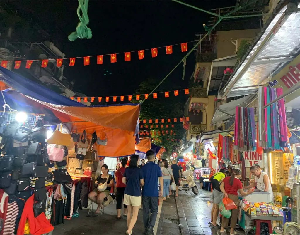 Visitors shopping at Hanoi Old Quarter Night Market during the weekend