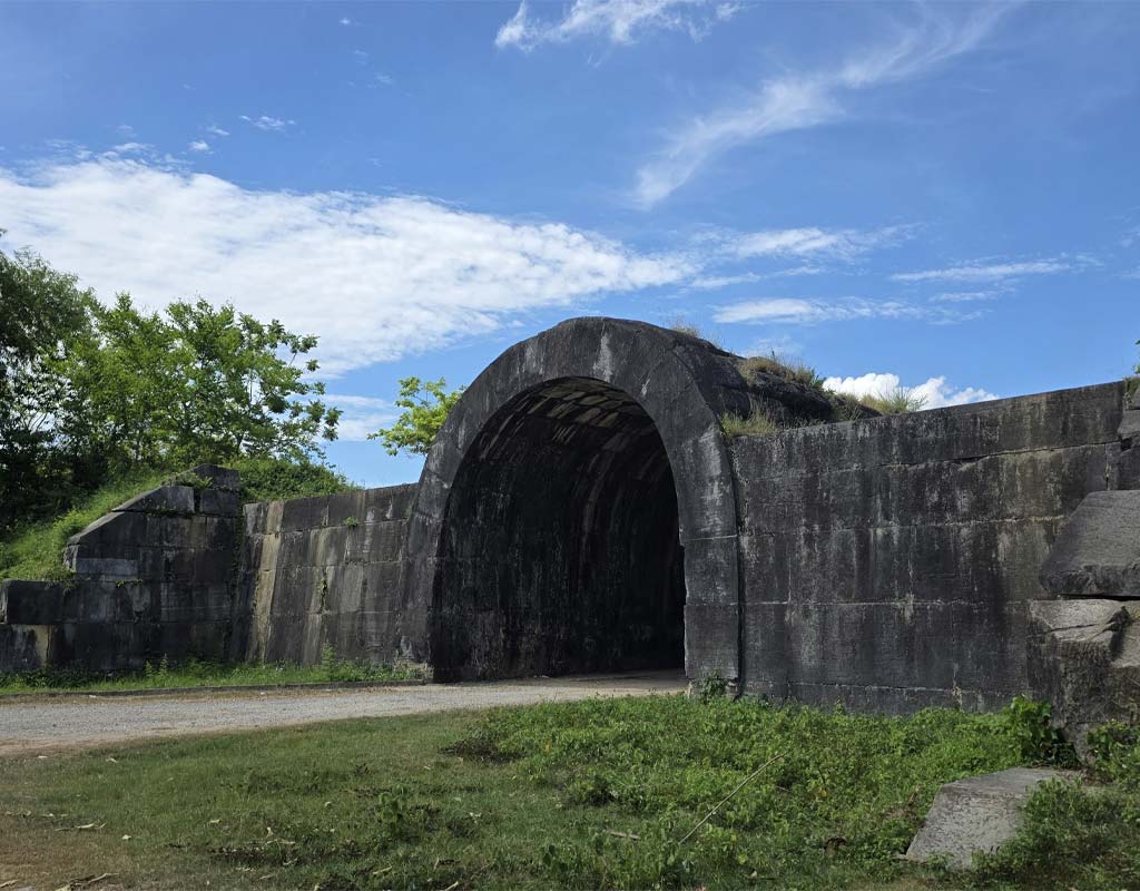 Massive stone walls of the Ho Dynasty Citadel in Thanh Hoa, VietnamTitle: Ho Dynasty Citadel