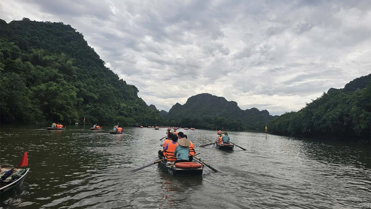 Boat tour through Trang An in Ninh Binh, one of Vietnam's most beautiful natural landscapes.