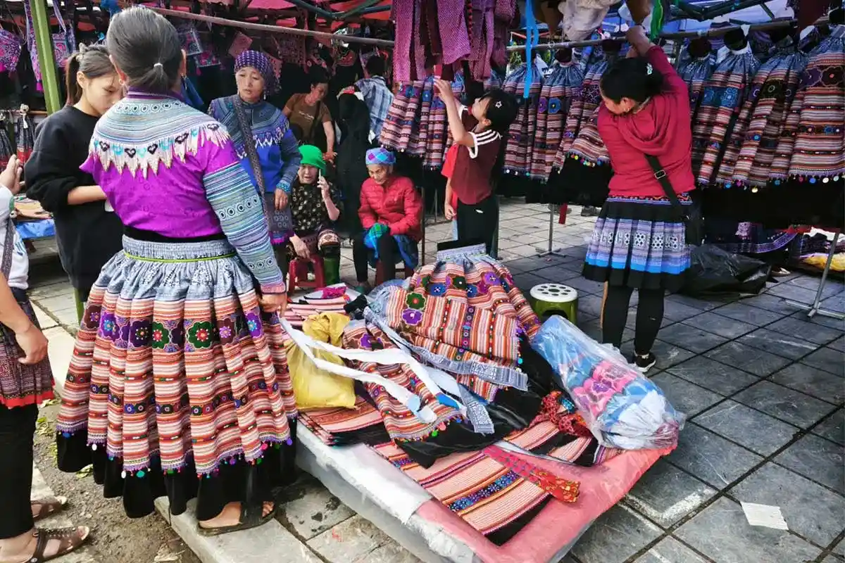 Colorful Flower Hmong traditional brocade and embroidered textiles in Bac Ha, Lao Cai