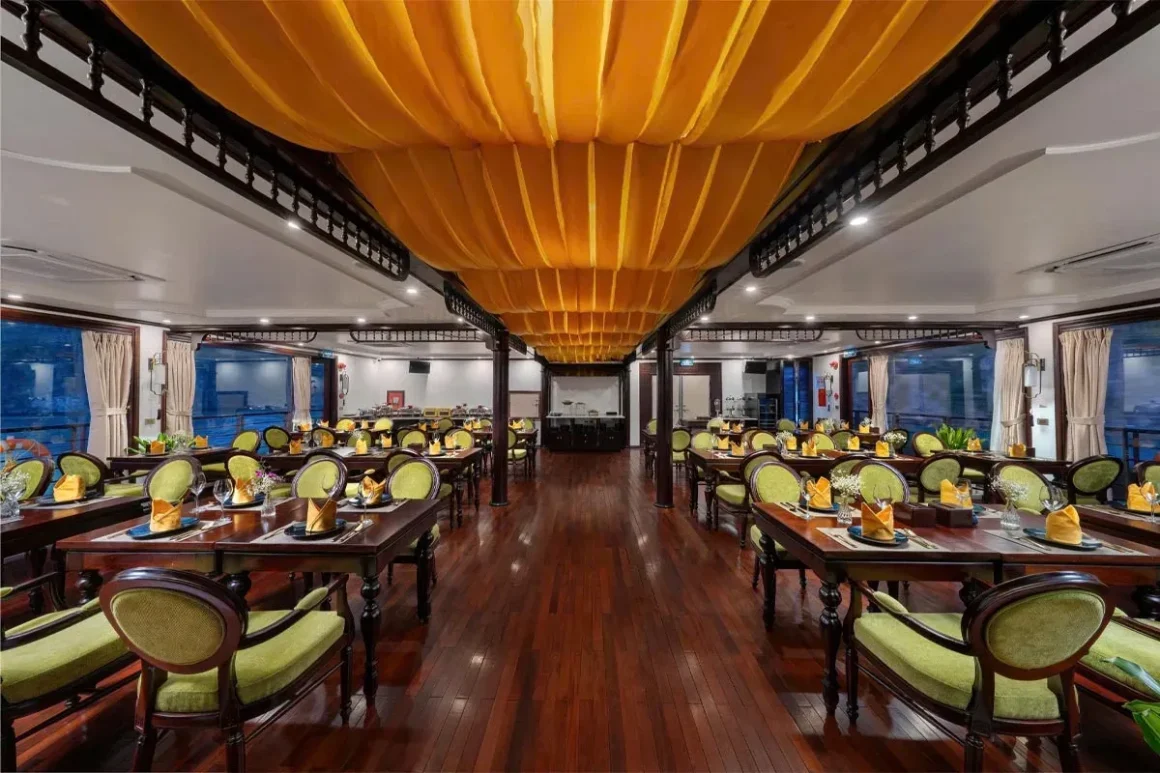 Gourmet Restaurant and Dining Area - Cycad Cruise Luxury dining restaurant interior aboard Cycad Cruise featuring panoramic sea-view windows and set tables