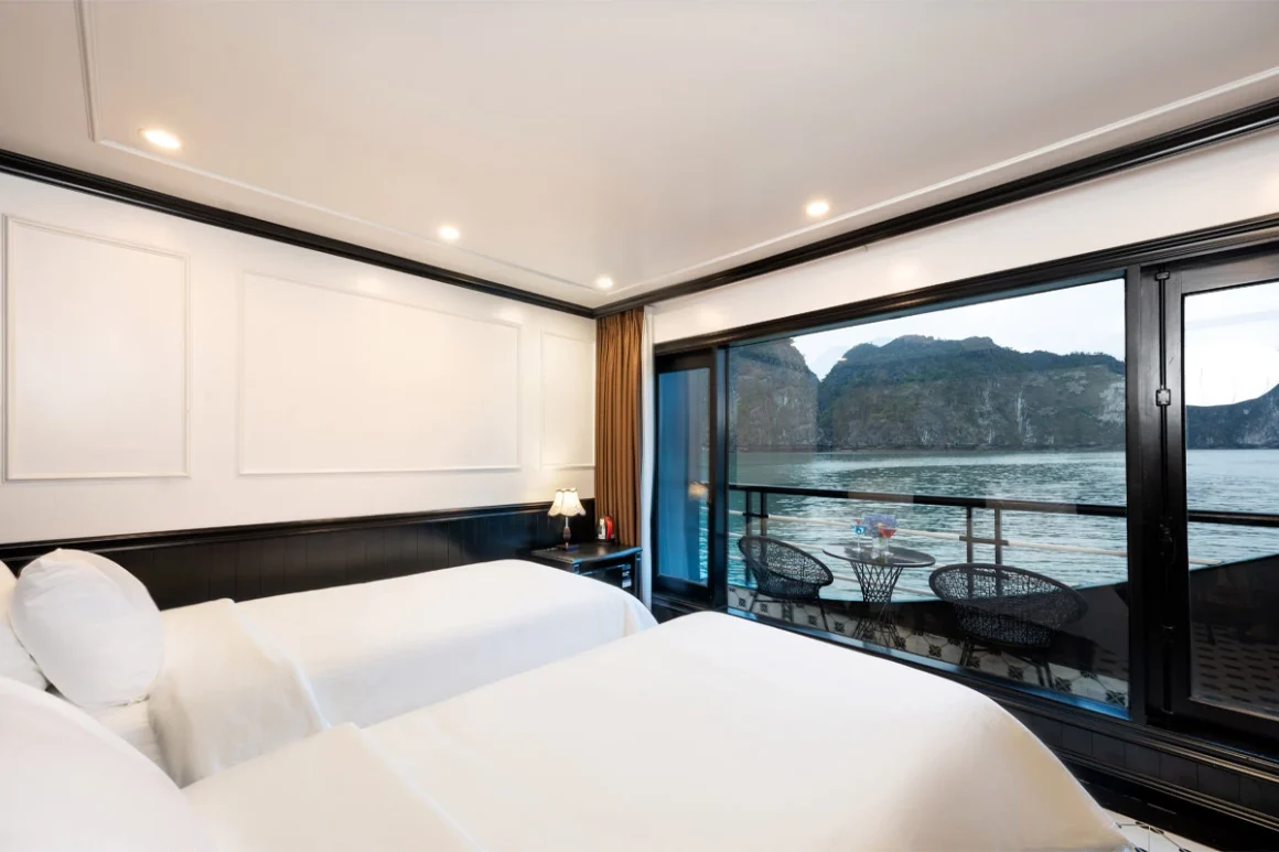Modern Deluxe Balcony cabin with private ocean view on Dragon Bay Premium Cruise