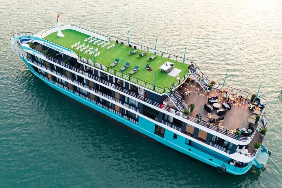 Spacious sundeck with sun loungers on Dragon Bay Premium Cruise overlooking Lan Ha Bay