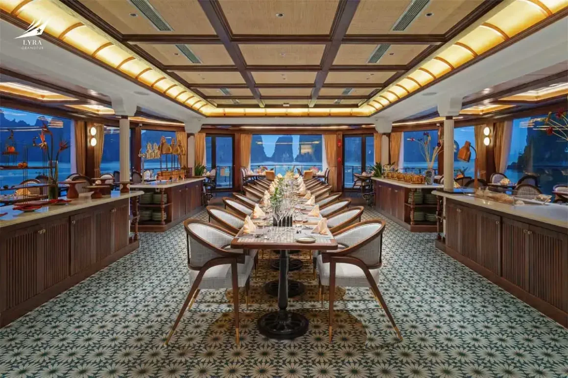 Lyra Grandeur Cruise Lan Ha Bay Restaurant & Bar uxury dining restaurant onboard Lyra Grandeur Cruise Lan Ha Bay with elegant tables and panoramic sea windows