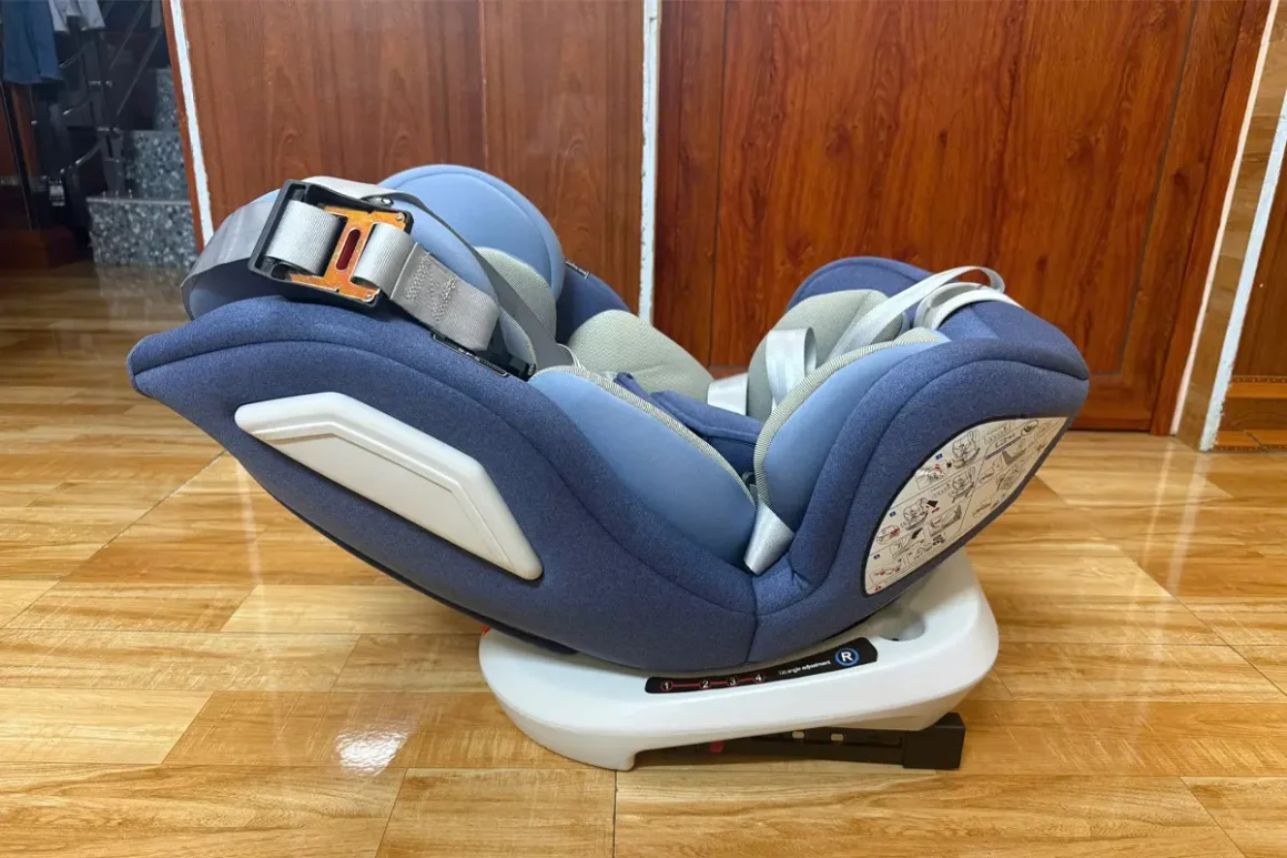 Child Seat in Executive Car Child seat installed in executive car for family transfer to Halong Bay