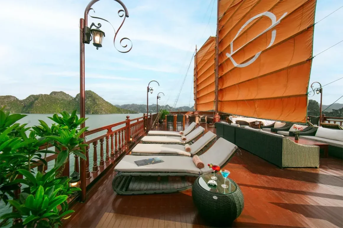 Spacious outdoor sundeck with sun loungers on Emperor Cruise Halong Bay