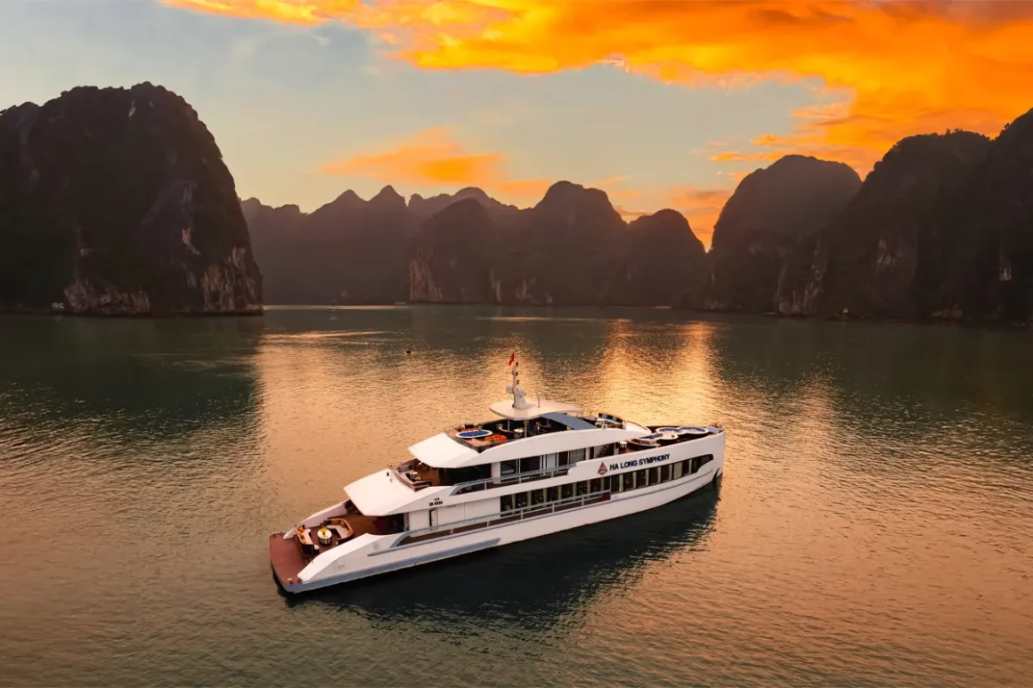 Halong Symphony Day Cruise on Ha Long Bay Halong Symphony day cruise ship anchored in the calm waters of Ha Long Bay