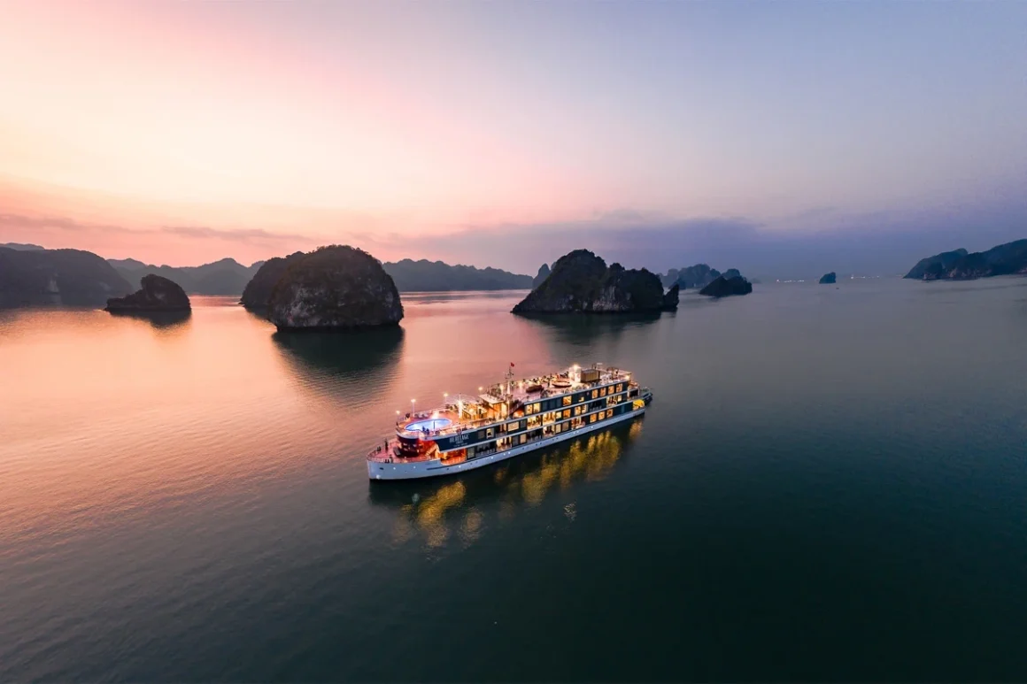 Heritage Cruise Binh Chuan Exterior Overview in Lan Ha Bay Heritage Cruise Binh Chuan sailing through the limestone karsts of Lan Ha Bay