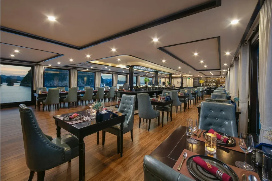 Hermes Cruise Halong Bay Fine Dining Restaurant Fine dining restaurant interior on Hermes Cruise Halong Bay with panoramic sea view windows