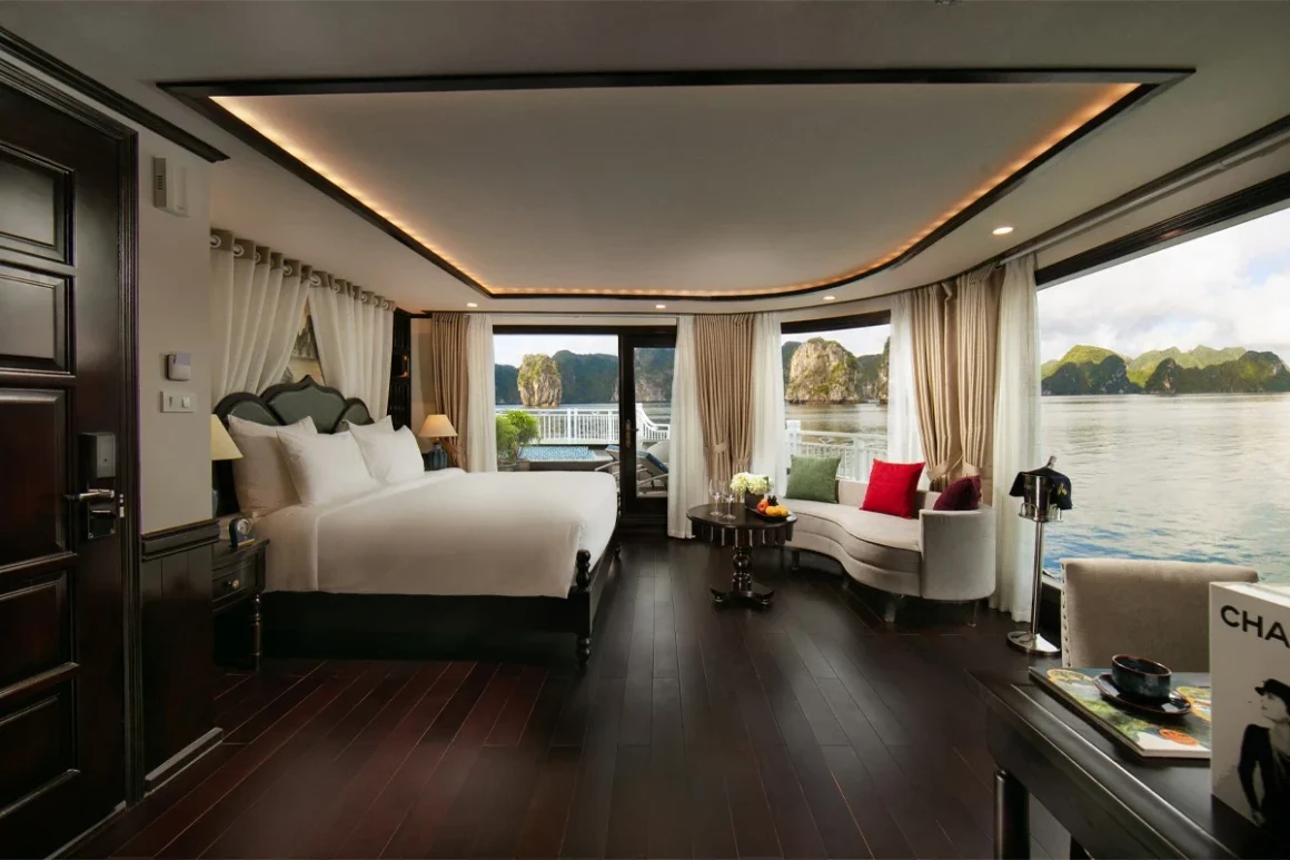 Hermes Cruise Halong Bay President Suite Balcony - Ultimate Luxury Ultra-luxury President Suite Balcony on Hermes Cruise Halong Bay featuring panoramic bow view and oversized terrace