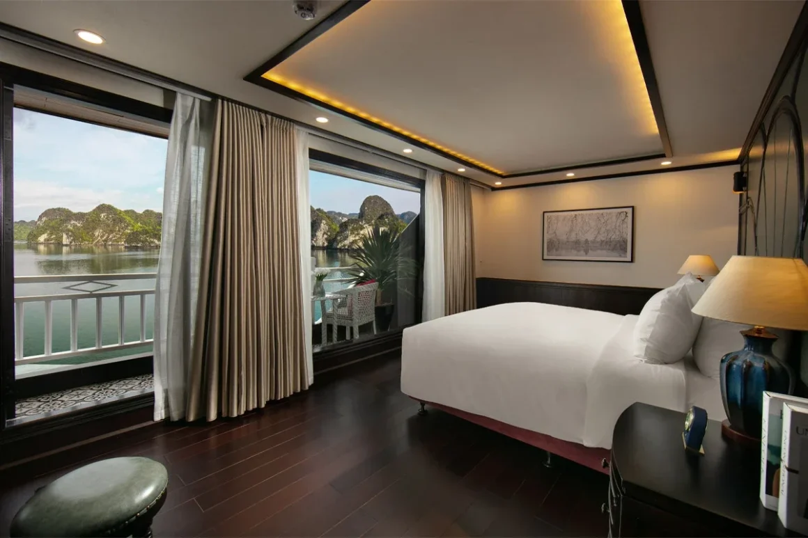 Hermes Cruise Halong Bay Senior Suite Balcony Cabin Senior Suite Balcony cabin on upper deck of Hermes Cruise Halong Bay with panoramic bay views