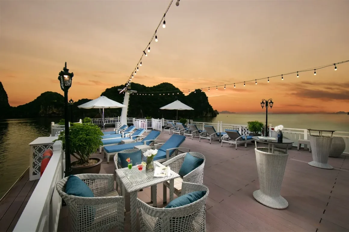 Hermes Cruise Halong Bay Rooftop Sundeck Spacious sundeck on Hermes Cruise Halong Bay featuring outdoor Jacuzzi pool and sun loungers