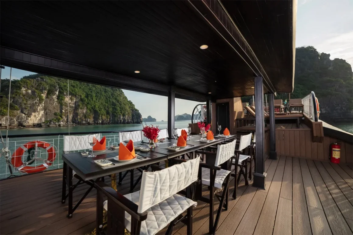 Outdoor dining area on the upper deck of Prince Junk