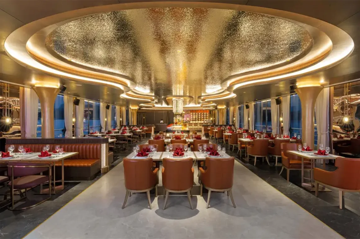 Capella Restaurant on Sea Stars Cruise Capella Restaurant on Sea Stars Cruise with panoramic windows over Halong Bay